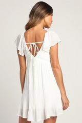 Amalfi Coast White Pleated Flutter Sleeve Mini Dress